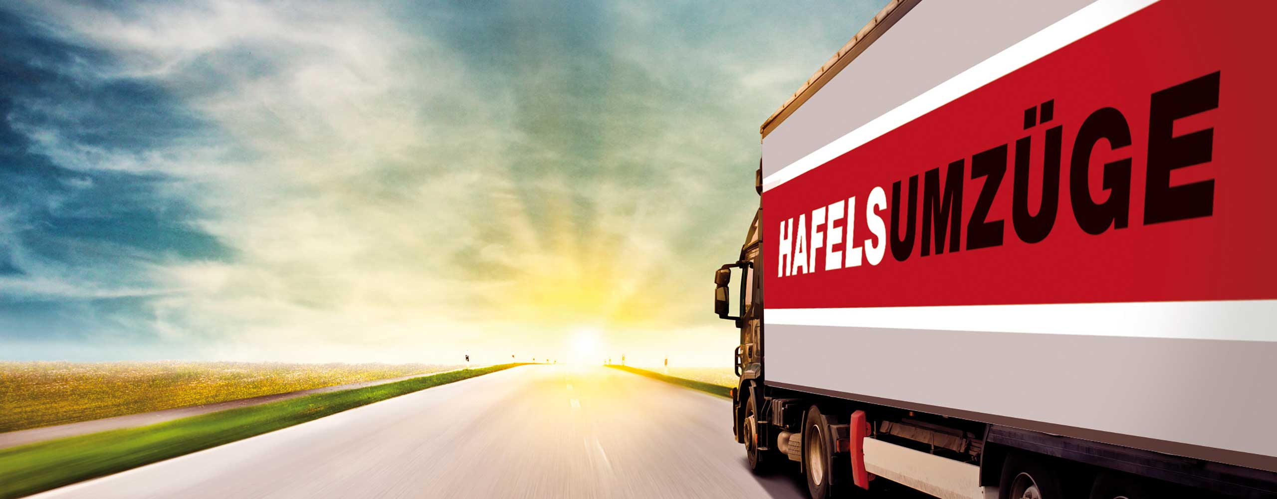 slide-mit-truck Truck von Hafels Umzüge auf Landstrasse